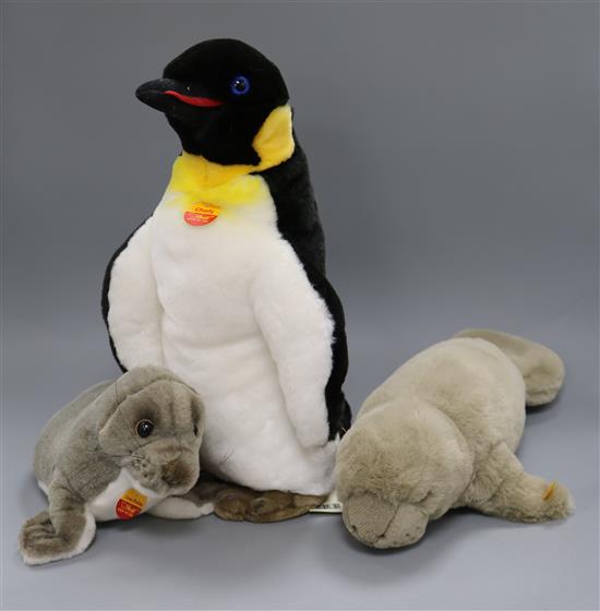 Three Steiff yellow tag toys: Manatee, Charly 40 Penguin and Cosy Robby Seal